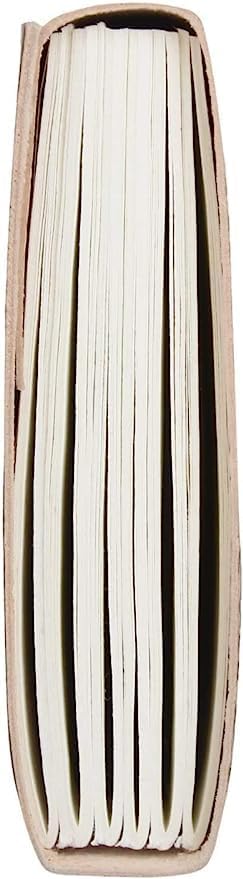Side view of the Jaald Tree of Life leather journal showing thick, cream-coloured deckle-edge paper and hand-bound spine.