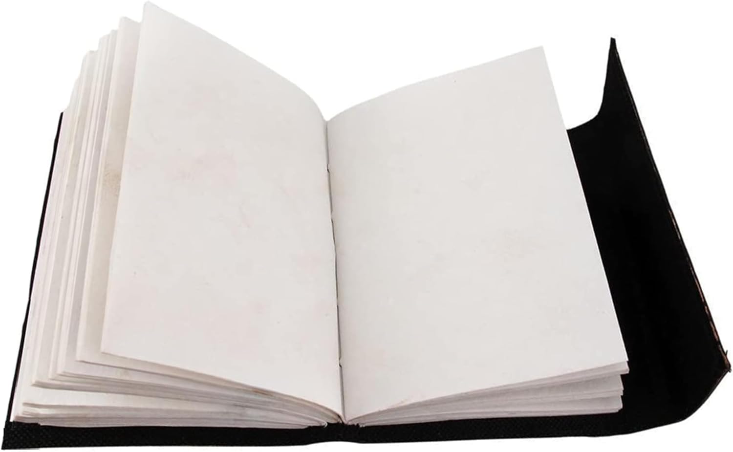 Open Jaald 25cm leather journal showing thick, blank handmade deckle edge paper pages and black cover.