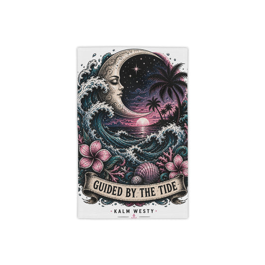 Beach towel with 'Guided by the Tide' moon and tropical waves design, hibiscus flowers, and palm trees at sunset.
