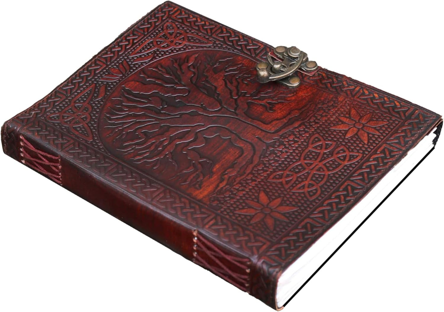 Handmade Jaald leather journal with embossed Tree of Life and Celtic patterns, featuring a brass C-hook clasp.