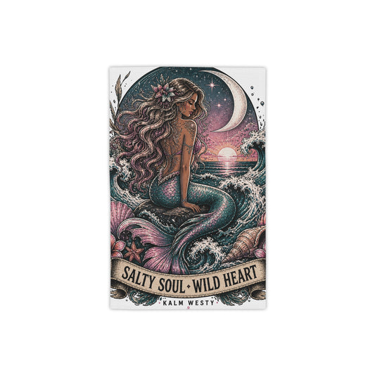 Vintage mermaid beach towel with sunset ocean scene, crescent moon, and 'Salty Soul Wild Heart' banner text.