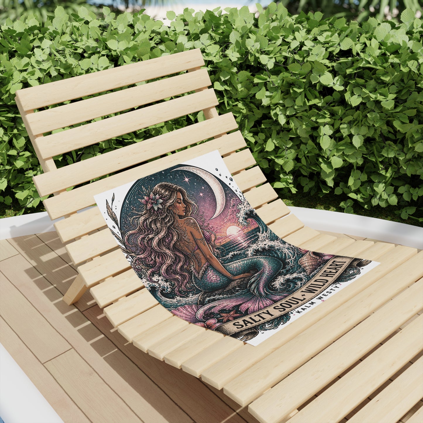 Vintage mermaid beach towel with Salty Soul Wild Heart text, displayed on a timber sun lounger outdoors.