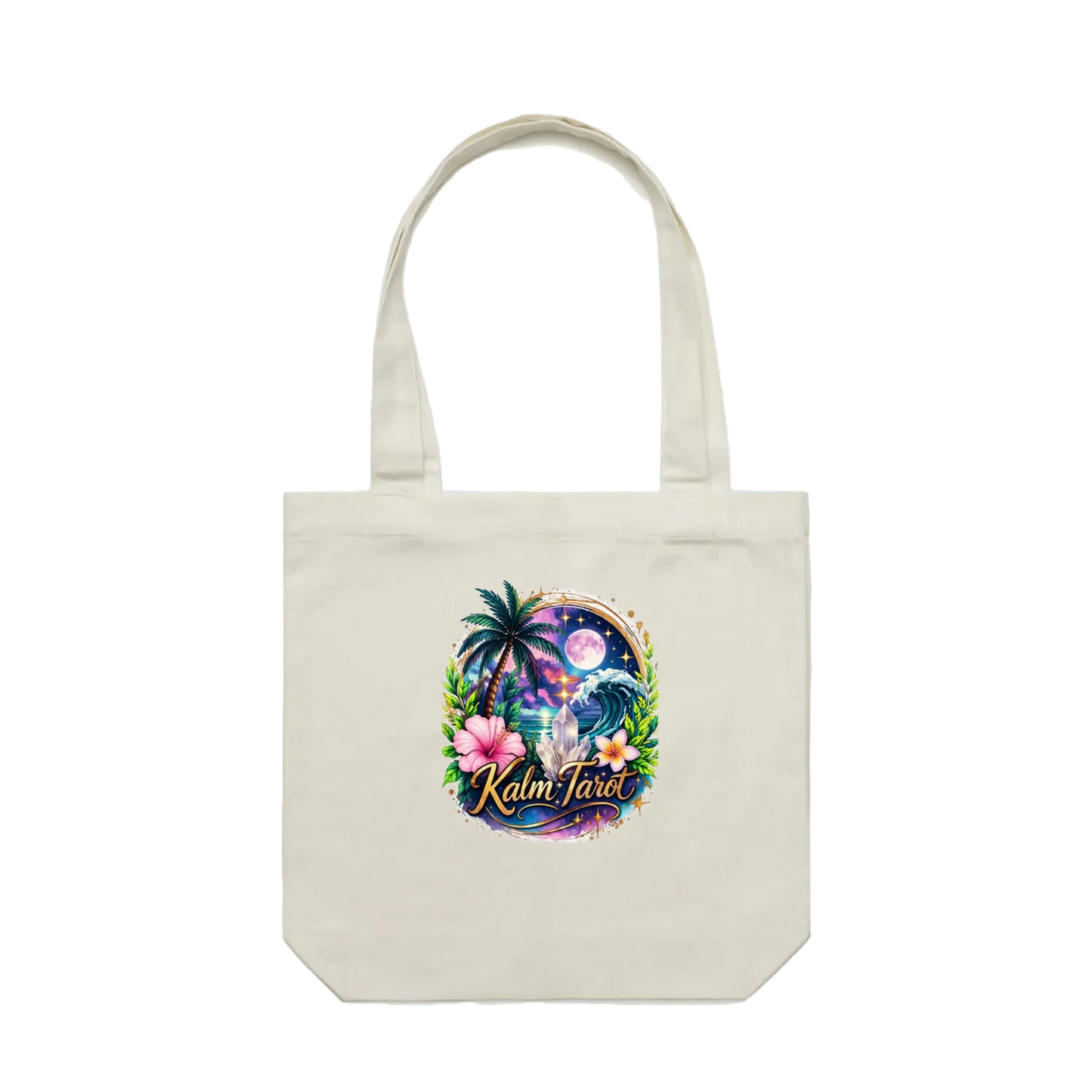 Kalm Tarot cream canvas tote bag featuring a tropical beach moon and palm tree graphic in a flat lay view.